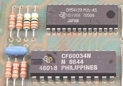 Texas Instruments CM54129 ML-AS and CF60034N, shown in close-up.