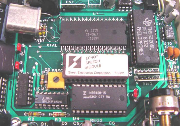 Circuit board with Rockwell R6511Q microprocessor, ECHO firmware, and TMS5220NL speech processor.