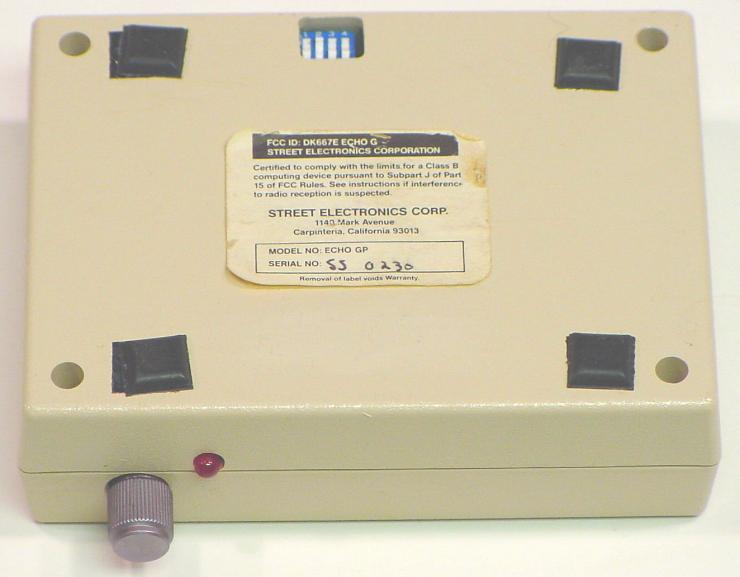 Underside manufacturer label and recessed configuration switches.