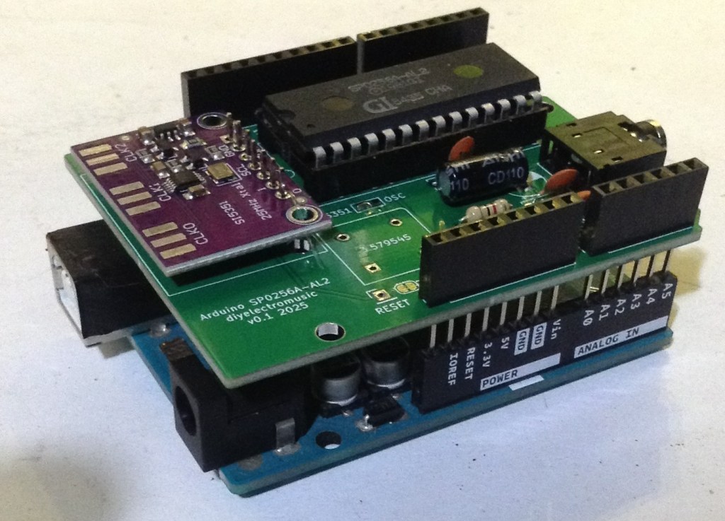 Arduino SP0256A-AL2 shield mounted on an Arduino board, with the speech chip installed.
