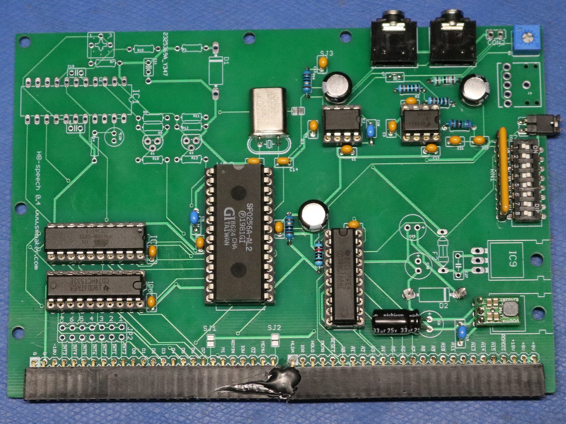 Completed Heathkit H8 speech board with the SP0256A-AL2 chip prominent and clearly labeled.