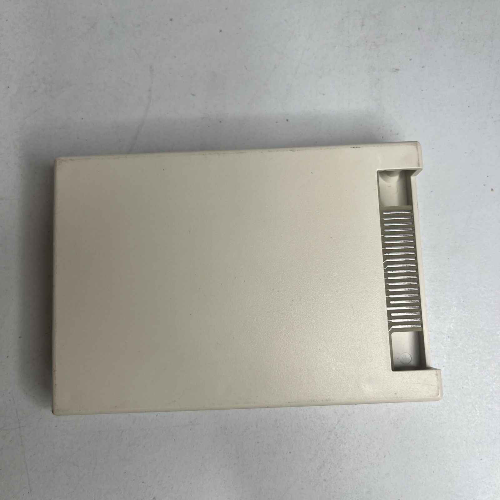 Cream-colored cartridge housing