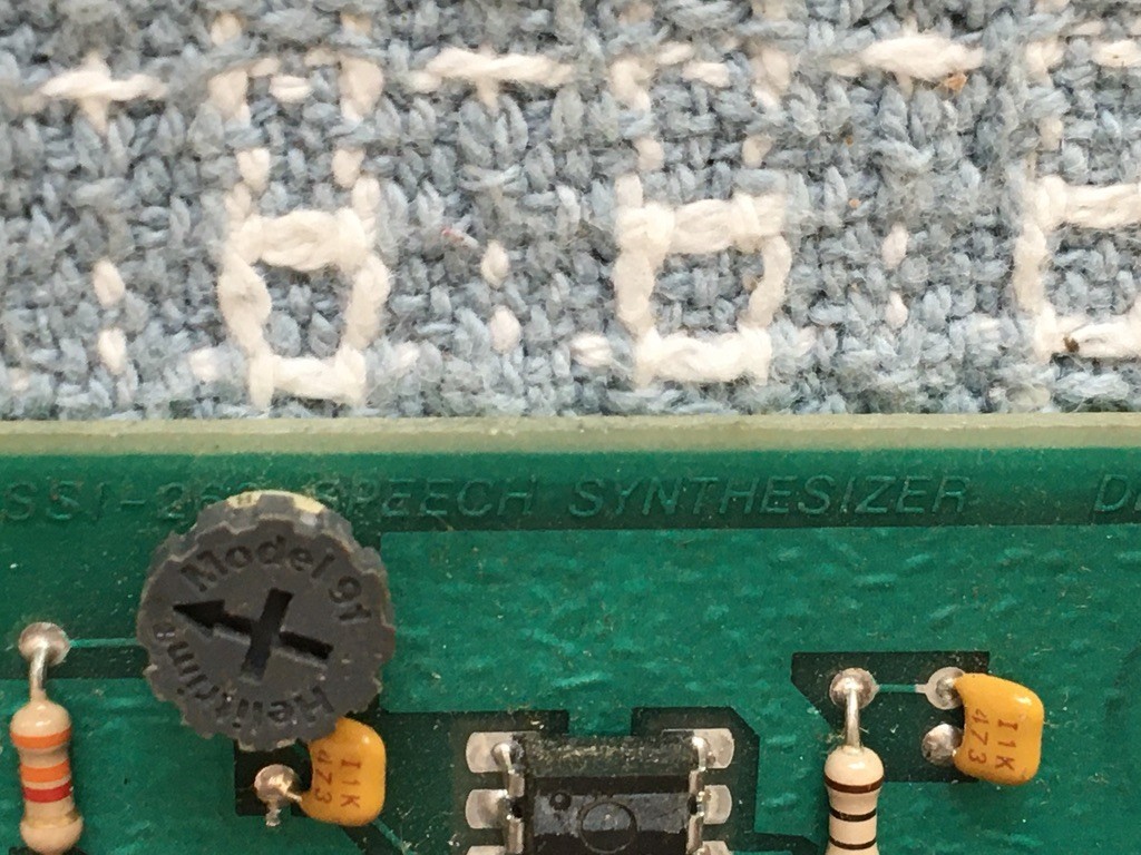 Speech synthesizer lettering and amplifier area