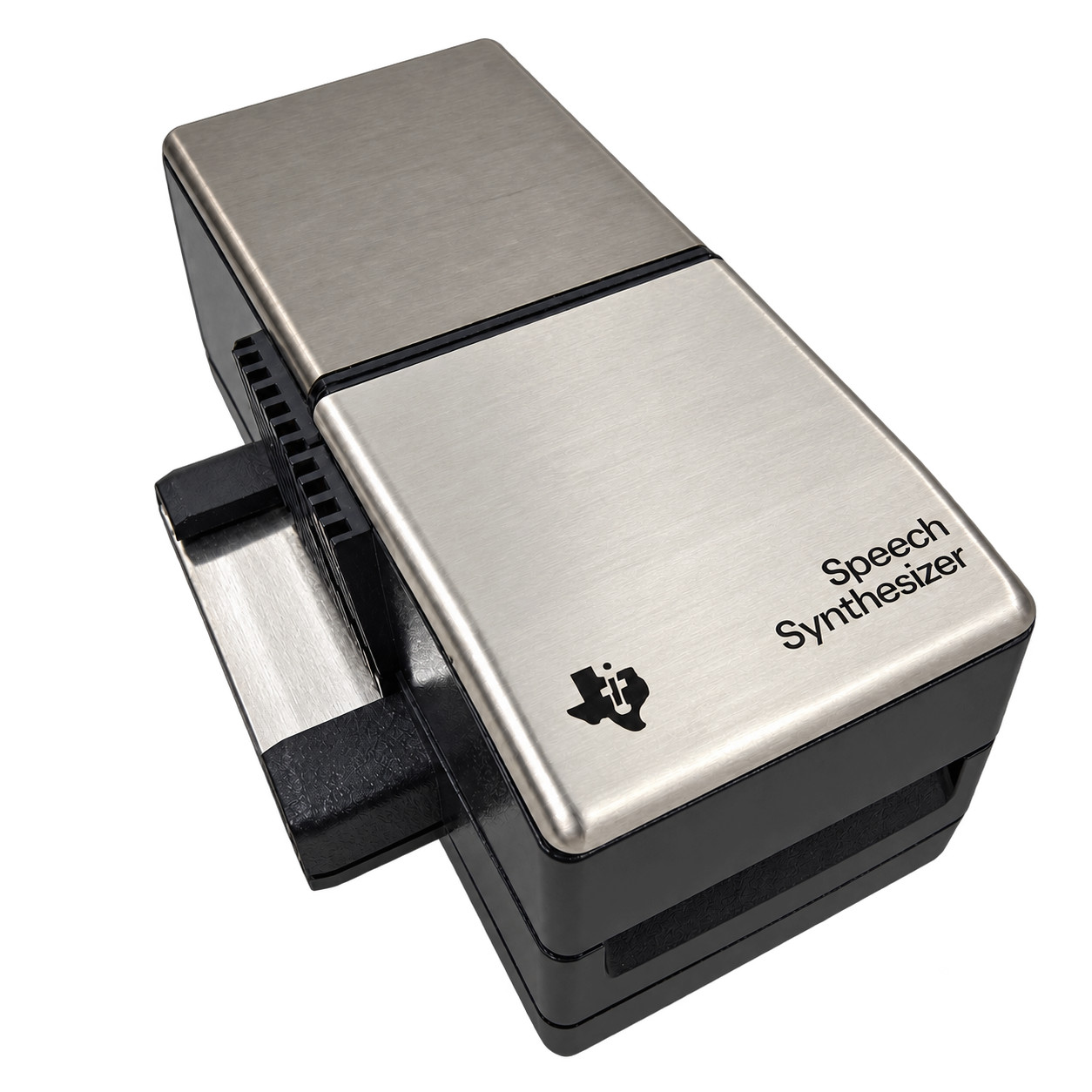 TI Solid State Speech Synthesizer sidecar connected at the computer’s expansion port.